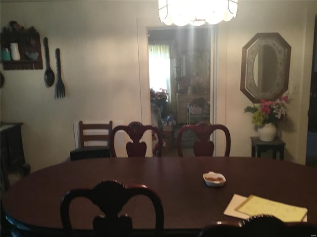 dining room featuring a notable chandelier