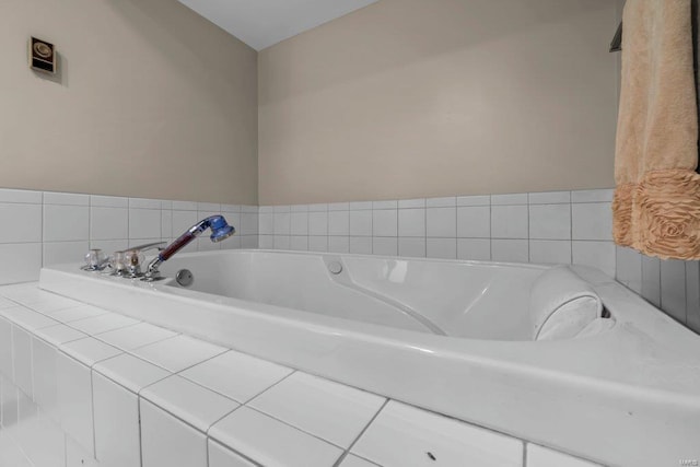 bathroom featuring a bath