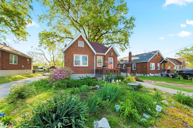 view of front of house featuring brick siding