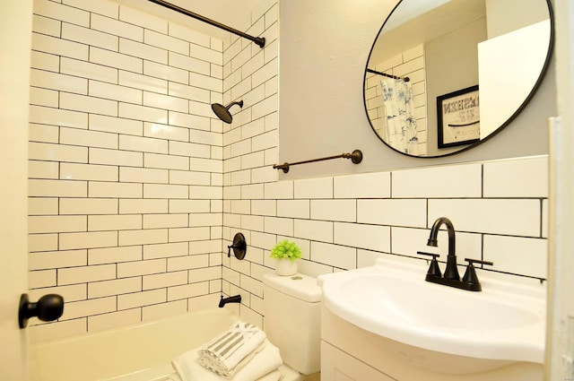bathroom featuring vanity, shower / bathtub combination with curtain, and toilet