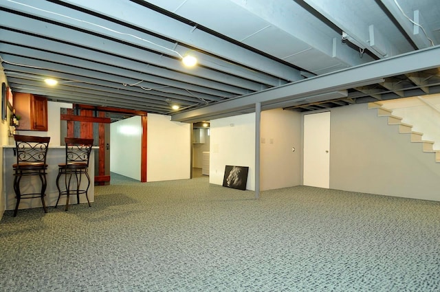 finished below grade area with carpet flooring