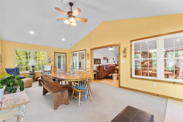 carpeted dining area with a ceiling fan, baseboards, lofted ceiling, and recessed lighting