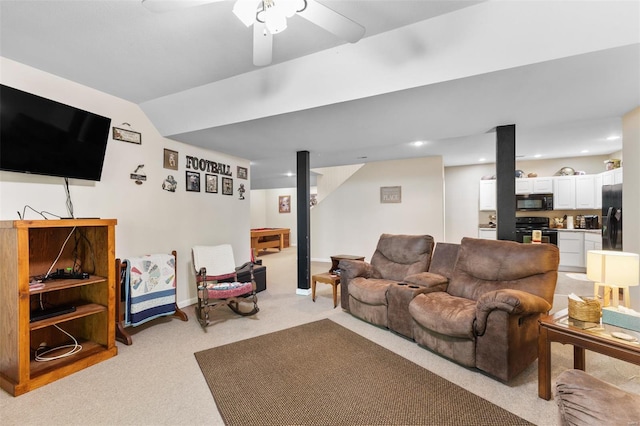 living room featuring light colored carpet, ceiling fan, and recessed lighting