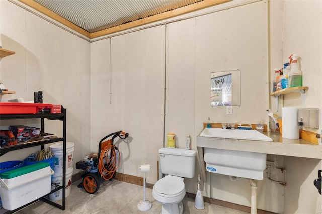 bathroom featuring toilet