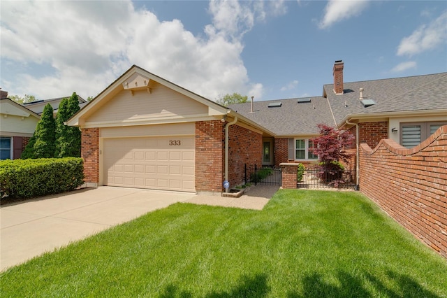 ranch-style home featuring a chimney, a garage, brick siding, fence, and concrete driveway