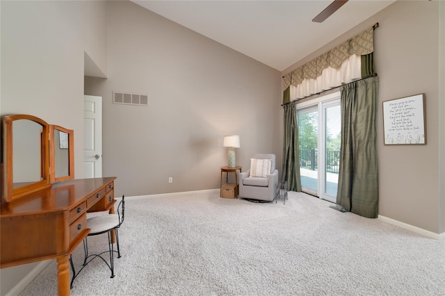 living area featuring carpet flooring, high vaulted ceiling, a ceiling fan, baseboards, and visible vents
