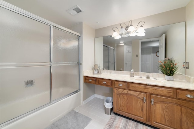 full bathroom featuring visible vents, tile patterned flooring, vanity, a chandelier, and enclosed tub / shower combo