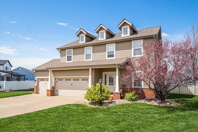 view of front of property with driveway, fence, a front lawn, an attached garage, and a shingled roof