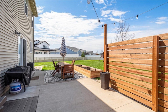 view of patio / terrace with outdoor dining space and a fenced backyard