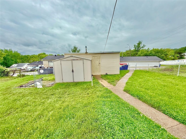 view of shed with fence