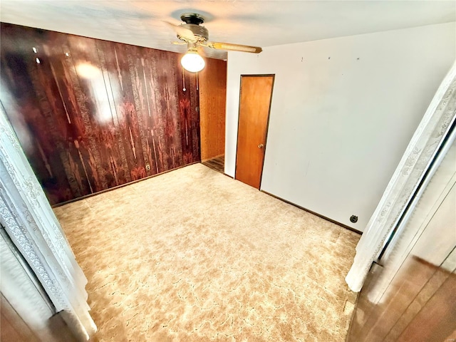 spare room featuring ceiling fan