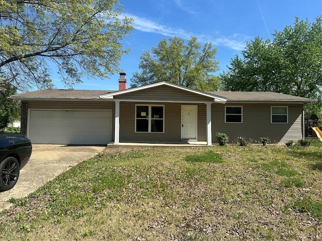 ranch-style home featuring a garage, a front yard, a chimney, a porch, and driveway