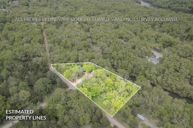 drone / aerial view with a forest view