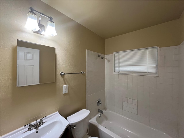 full bath with shower / bathtub combination, toilet, and vanity