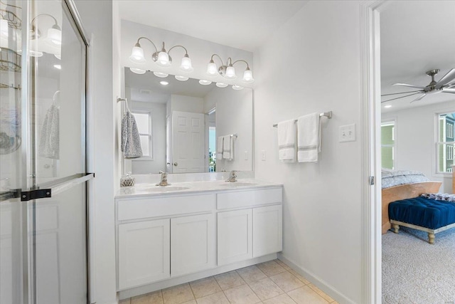 bathroom with baseboards, a sink, ensuite bath, and a stall shower