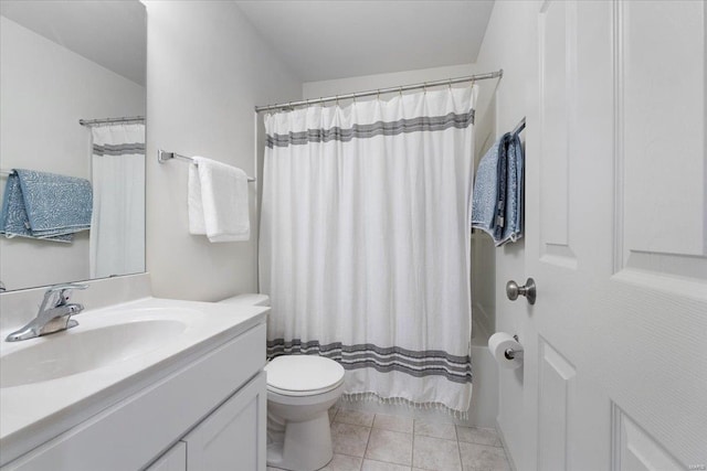 full bathroom featuring vanity, tile patterned floors, toilet, and a shower with curtain