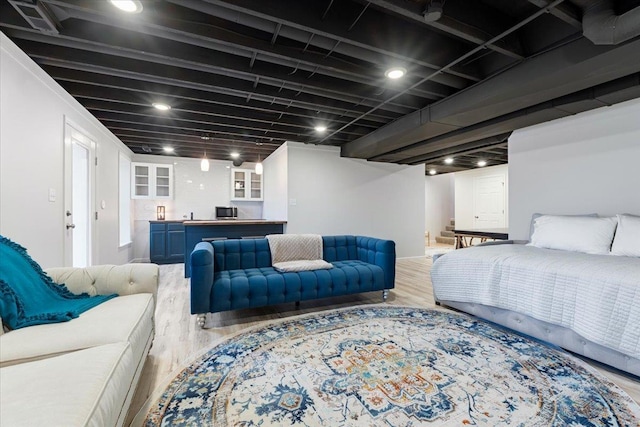 bedroom with light wood-style floors