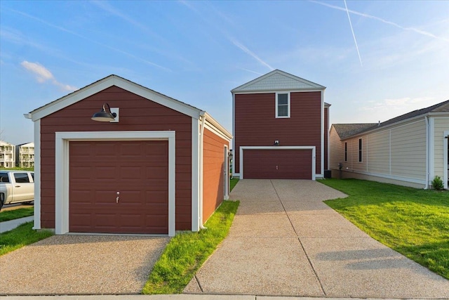 view of front of property featuring a garage and an outdoor structure