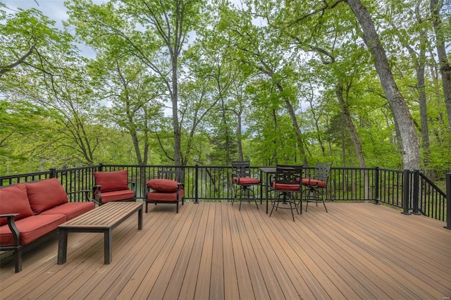 deck with an outdoor hangout area and outdoor dining space
