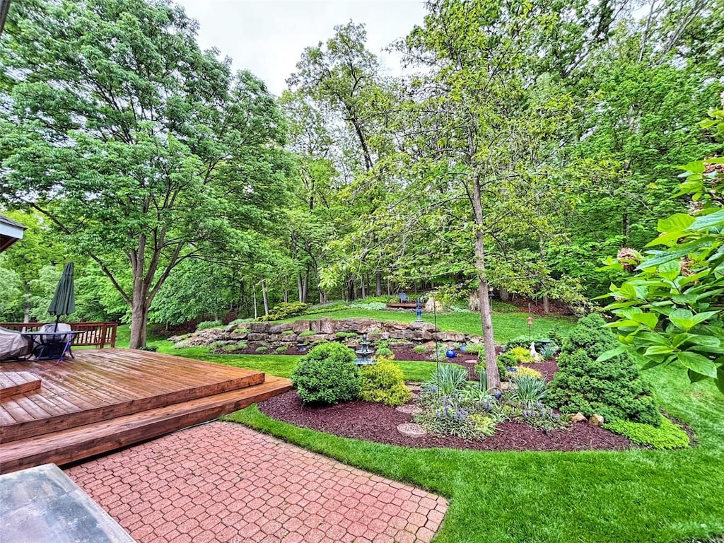 view of yard with a wooden deck