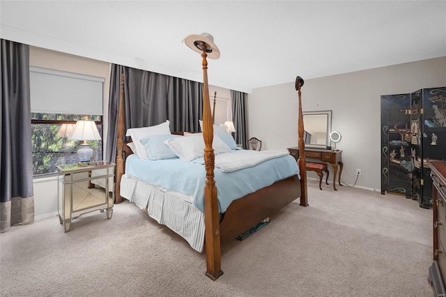 bedroom with baseboards and carpet flooring