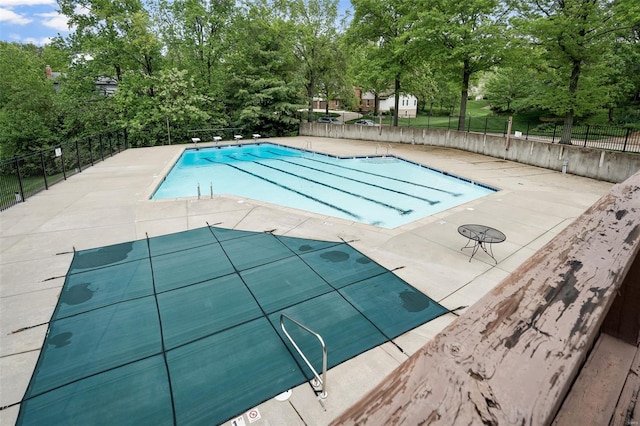 community pool with fence
