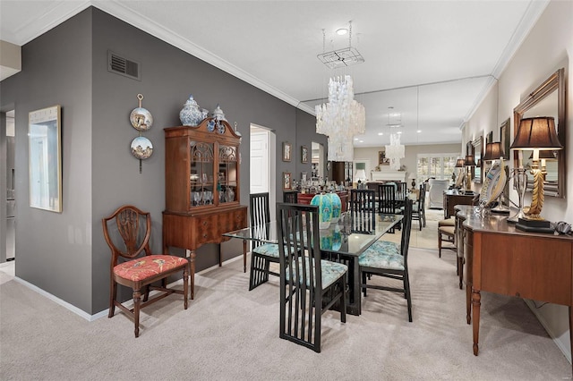 dining space with crown molding, an inviting chandelier, light carpet, baseboards, and visible vents