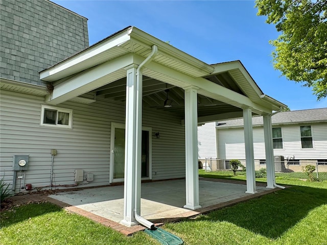 view of patio / terrace featuring fence