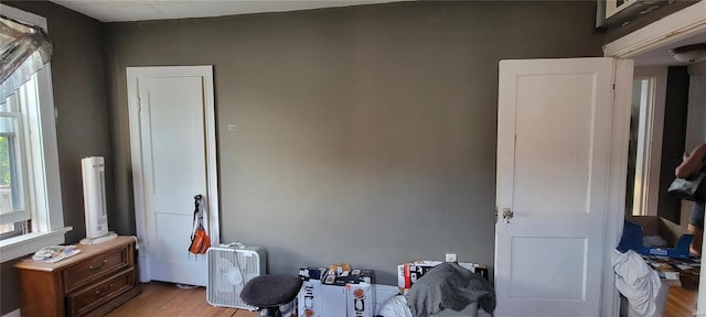 bedroom with wood finished floors
