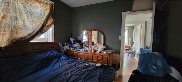 bedroom featuring wood finished floors