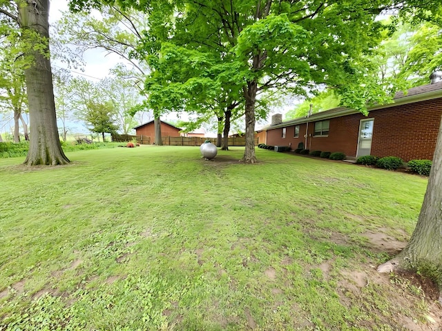 view of yard featuring fence
