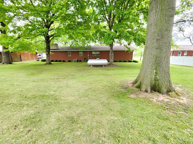 view of yard with fence