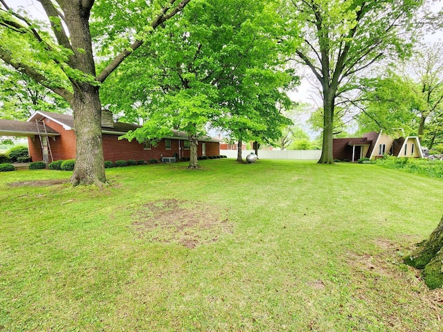 view of yard featuring fence