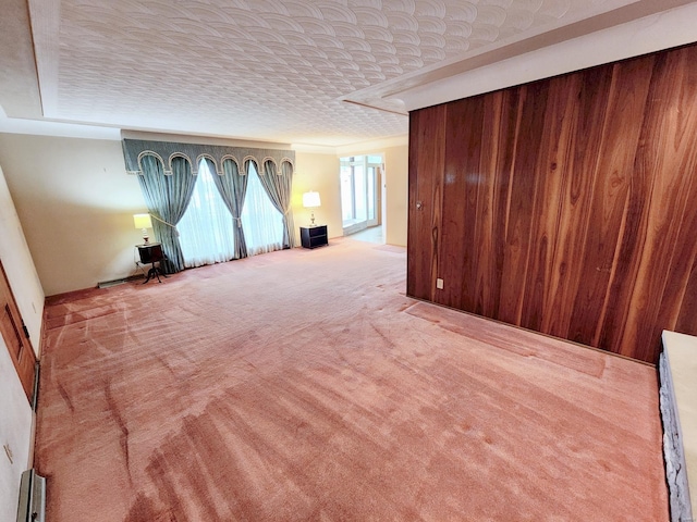unfurnished room featuring carpet