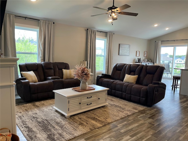 living area with a healthy amount of sunlight and wood finished floors