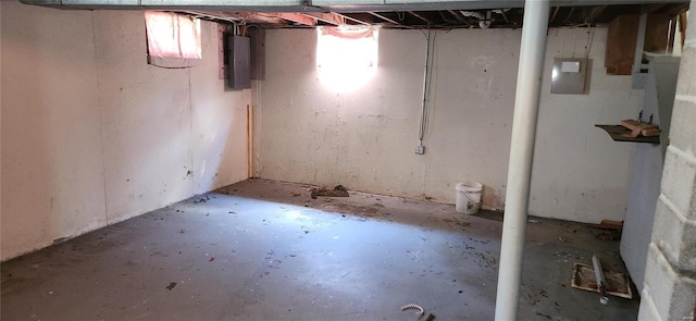 unfinished below grade area with electric panel
