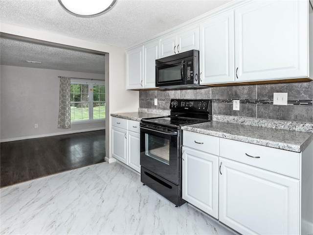 kitchen with black appliances, white cabinets, tasteful backsplash, a textured ceiling, and light countertops
