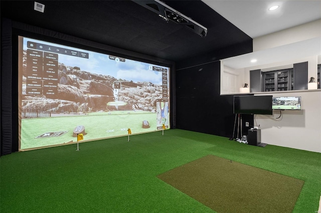 recreation room with golf simulator and carpet