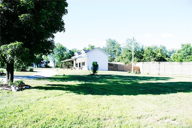 view of yard with fence