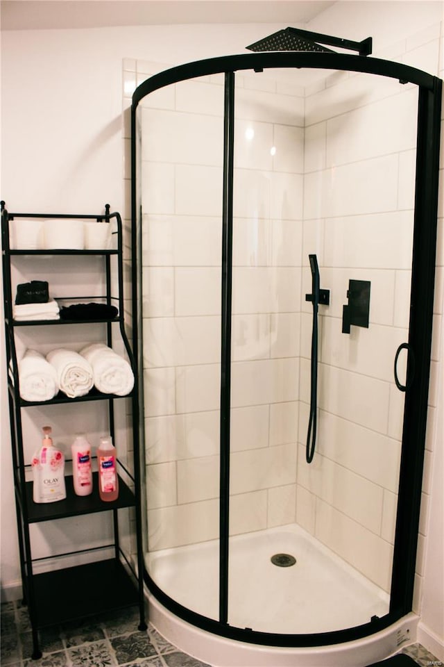 bathroom featuring a shower stall