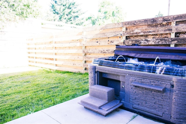 view of patio / terrace featuring fence