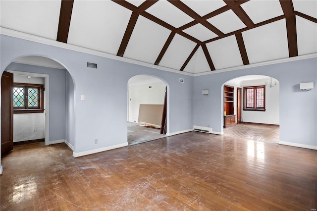 unfurnished living room with baseboards, beamed ceiling, visible vents, and high vaulted ceiling