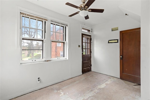 entrance foyer featuring baseboards, visible vents, and ceiling fan