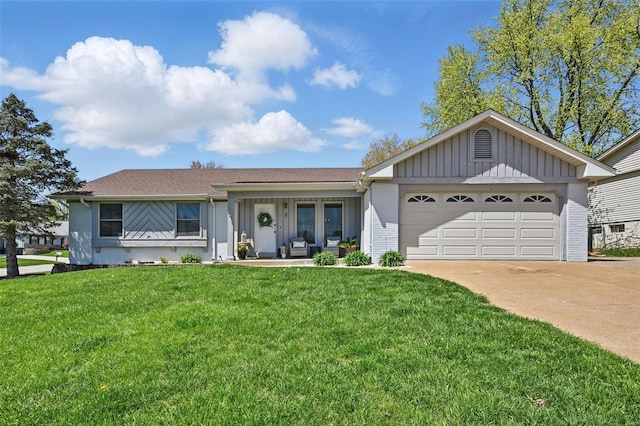 ranch-style house featuring driveway, board and batten siding, brick siding, a garage, and a front yard