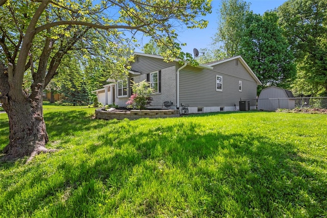 view of property exterior with central AC
