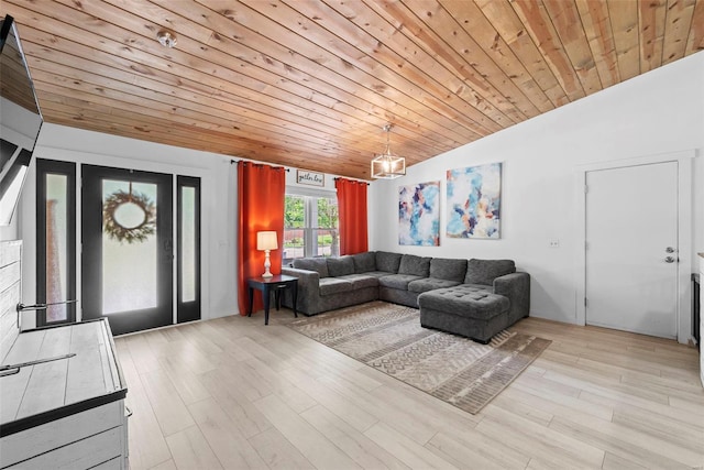 living room with lofted ceiling, wooden ceiling, and light wood-style flooring