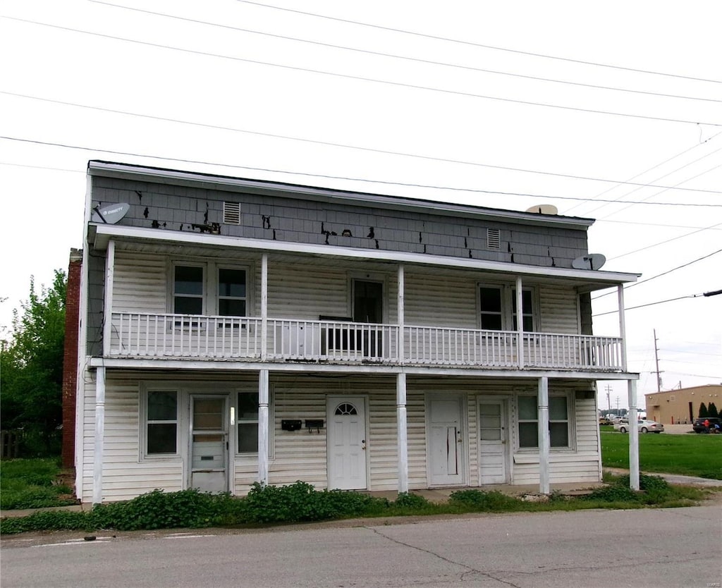 view of property with a balcony
