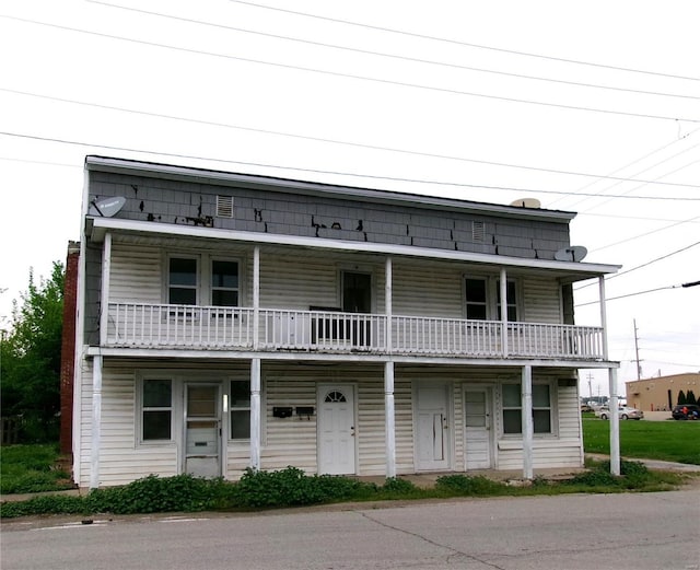 view of property with a balcony