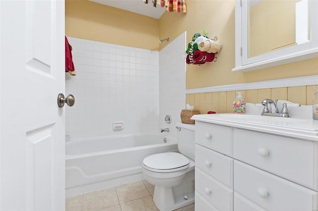 full bathroom featuring toilet, tile patterned floors, vanity, and tub / shower combination