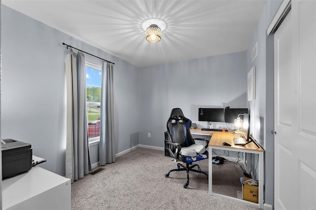 office area with carpet, baseboards, and visible vents